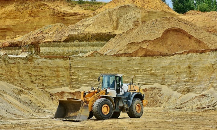 Yellow Loader Used For Removing Mud