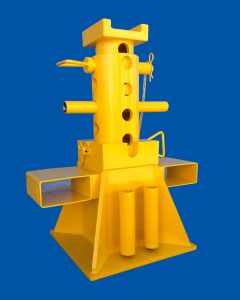 Yellow industrial equipment on blue background.